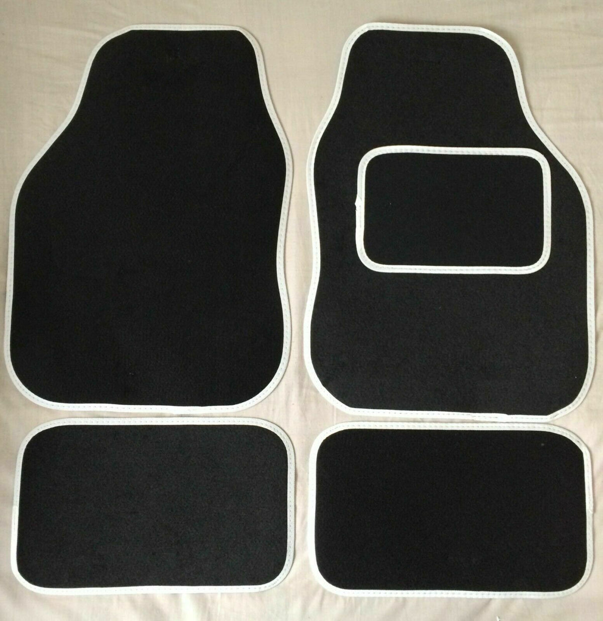 UNIVERSAL CAR FLOOR MATS BLACK WITH RED EDGING - 4 PIECE SET